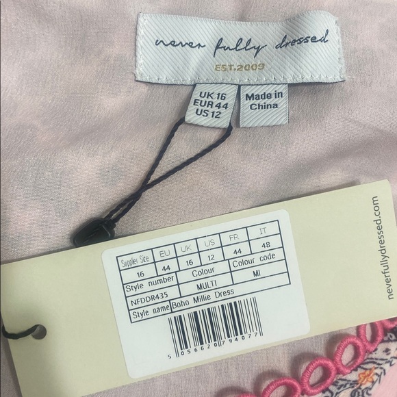 Boho Millie Dress Never Fully
Dressed Multicolor V-Neck Bohemian Dress - Picture 13 of 14